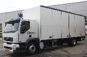 Distributionsbilen ruller sig ud med folded�rskasse 